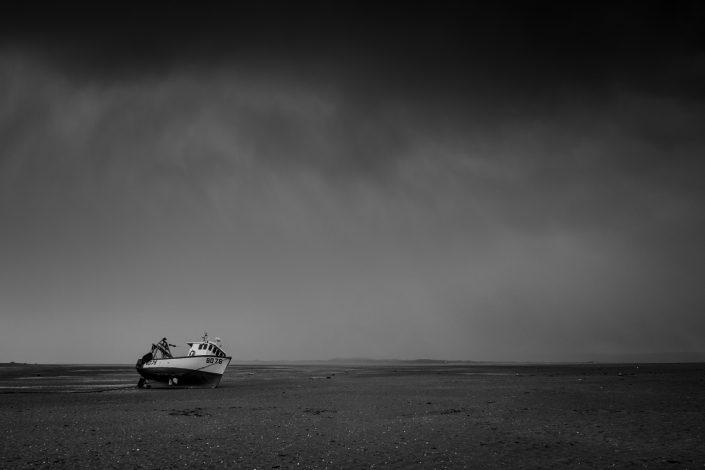 Boat on A Rainy Instow Beach - David Anderson