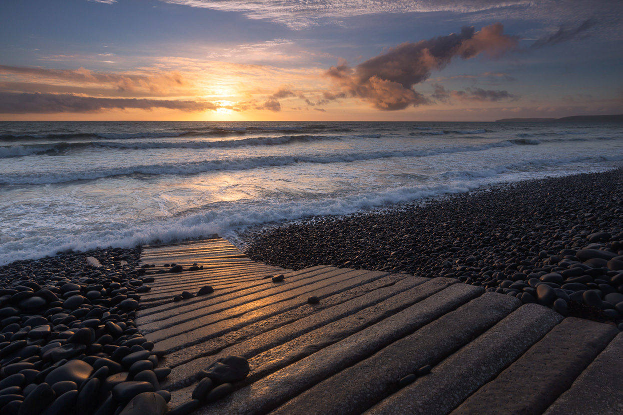 Westward Ho! beach pathway at sunset. Seascape photography by David Anderson